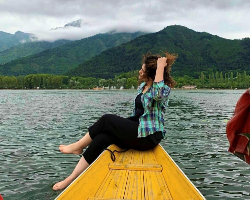 Dal Lake, Kashmir, tourist paradise of Srinagar with clear water, Shikara float, Pir Panjal Mountains, Places to visit in Kashmir