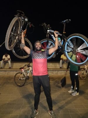 Boy Posing With Cycles Mumbai Midnight Cycling | Hikerwolf