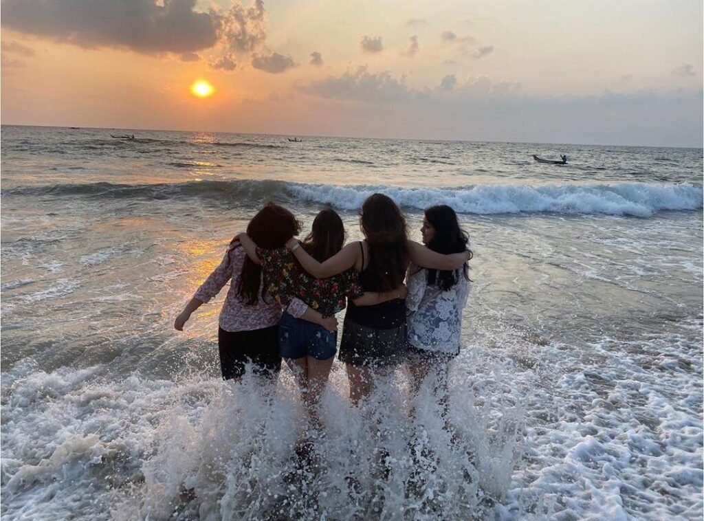 Serenity Beach, girls posing in the waves