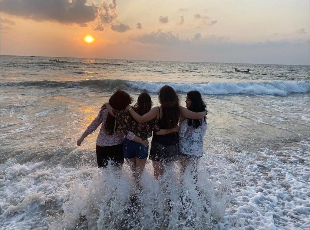 Serenity Beach, girls posing in the waves