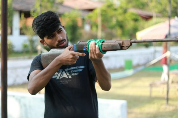 Boy Aiming Target| Camping Near Pune -Hikerwolf